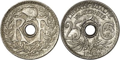 a close up of two silver coins on a white background