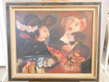 un tableau représentant une femme et un enfant, posé sur un chevalet