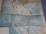 an old map of the world on a blue background
