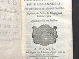 an open book with a picture of a coat of arms on it