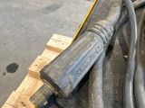 a couple of hoses that are sitting on a pallet