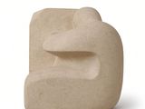 an image of a stone sculpture of a man ' s face