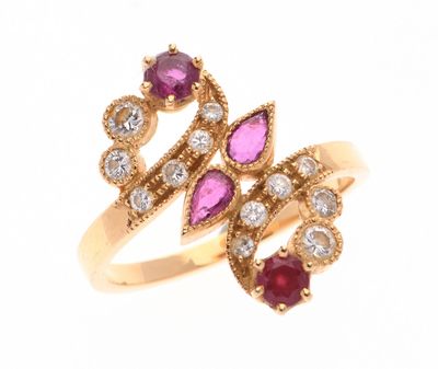 BAGUE en or jaune 750 °/°° en forme de rinceaux sertie de br…