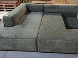 a couch that is sitting on the floor in a room