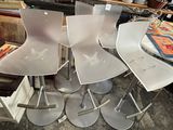 a lot of chairs that are sitting on the floor