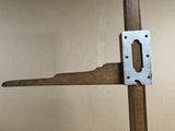 a close up of a door handle on a wooden door