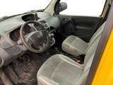 a yellow car with a steering wheel and a dashboard
