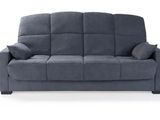 the couch is blue and has two pillows on top of it