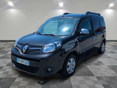 the black van is parked on a checkered floor in a room