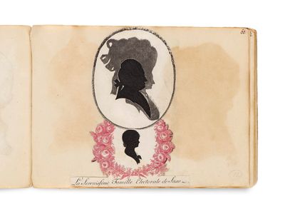 an old book with a drawing of a woman and a man