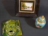 two vases and a picture on the table