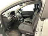 the interior of a car with the driver ' s seat folded down