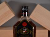 a bottle of liquor that is sitting on a table