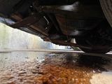 a close up view of a car ' s exhaust pipe and exhaust pipe