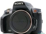 the front view of a digital camera on a white background