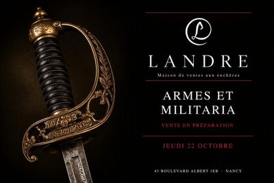 a sword with a gold handle on a black background