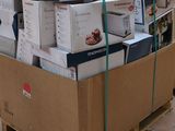 many boxes stacked on top of each other on a pallet