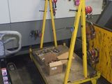 a cart with a bunch of tools on it in a garage
