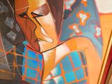 un tableau représentant une femme accroché au mur