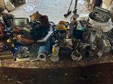 a table with a lot of assorted items on top of it