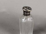 two salt and pepper shakers sitting on a table