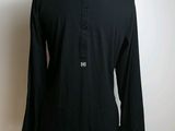 a woman ' s black shirt on a mannequin mannequin mannequin mannequin mannequin mannequin mannequin mannequin