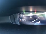 a close up of a car ' s dashboard with a speedometer