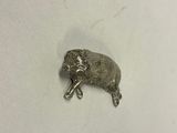 an elephant figurine sitting on top of a white surface