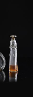 a glass bottle with a liquid inside of it