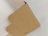 a cardboard box that has a pair of scissors sticking out of it
