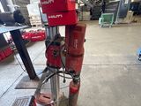 a red machine that is sitting in a room