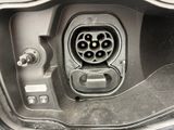 a close up of a car ' s interior with an electrical plug