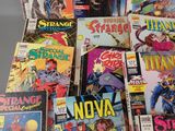 a lot of comic books sitting on a table