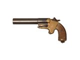 un gros plan d'un pistolet sur un fond blanc avec un fond blanc