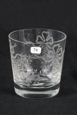 a close up of a glass cup with a number on it