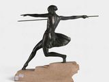 bronze statue of a man holding a spear on a marble base