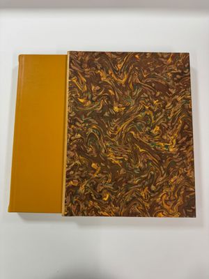 a brown and yellow notebook with a brown cover