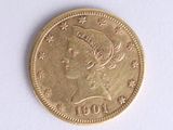 a gold coin with a woman ' s head on it