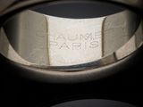 a close up of a ring with a label on it