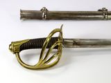 pair of antique swords on white background with one sword in the foreground