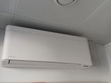 a picture of a wall mounted air conditioner on the ceiling