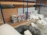 a room with a lot of boxes and boxes on the floor
