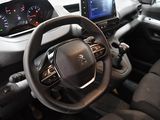 a steering wheel and dashboard of a small car
