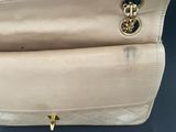 chanel beige quilted leather bag with gold hardware