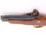 a close up of a gun on a white background