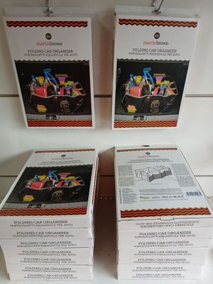 three boxes of pizza sitting on top of a table next to each other