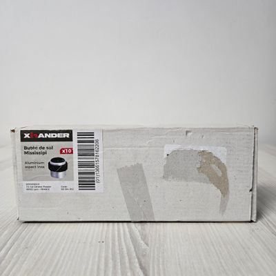 a box that is sitting on the floor with a sticker on it