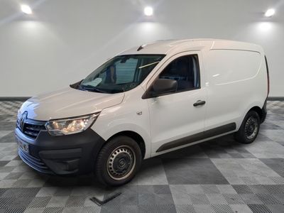 the white van is parked on a checkered tile floor