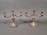 pair of silver plated candelabs with candlesticks on stands