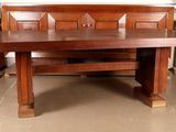 a wooden bench that is in the middle of a room